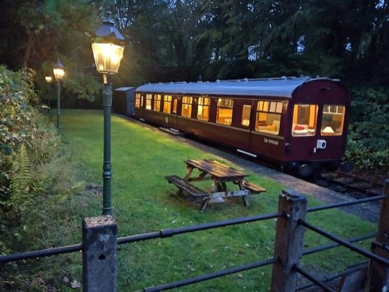 1960s railway carriage in a country station, a train in Bredenbury, England